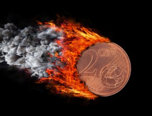 Burning coin with a trail of fire and smoke - 2 eurocent